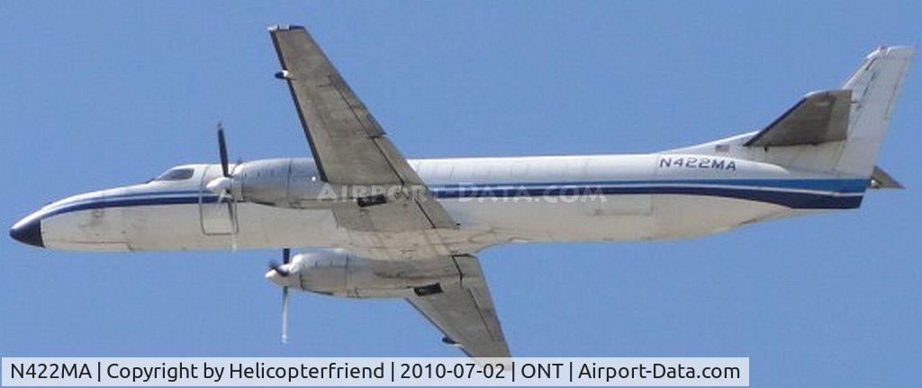 N422MA, 1986 Fairchild SA-227AC Metro III C/N AC-635, Just took off from 26R and is heading westbound
