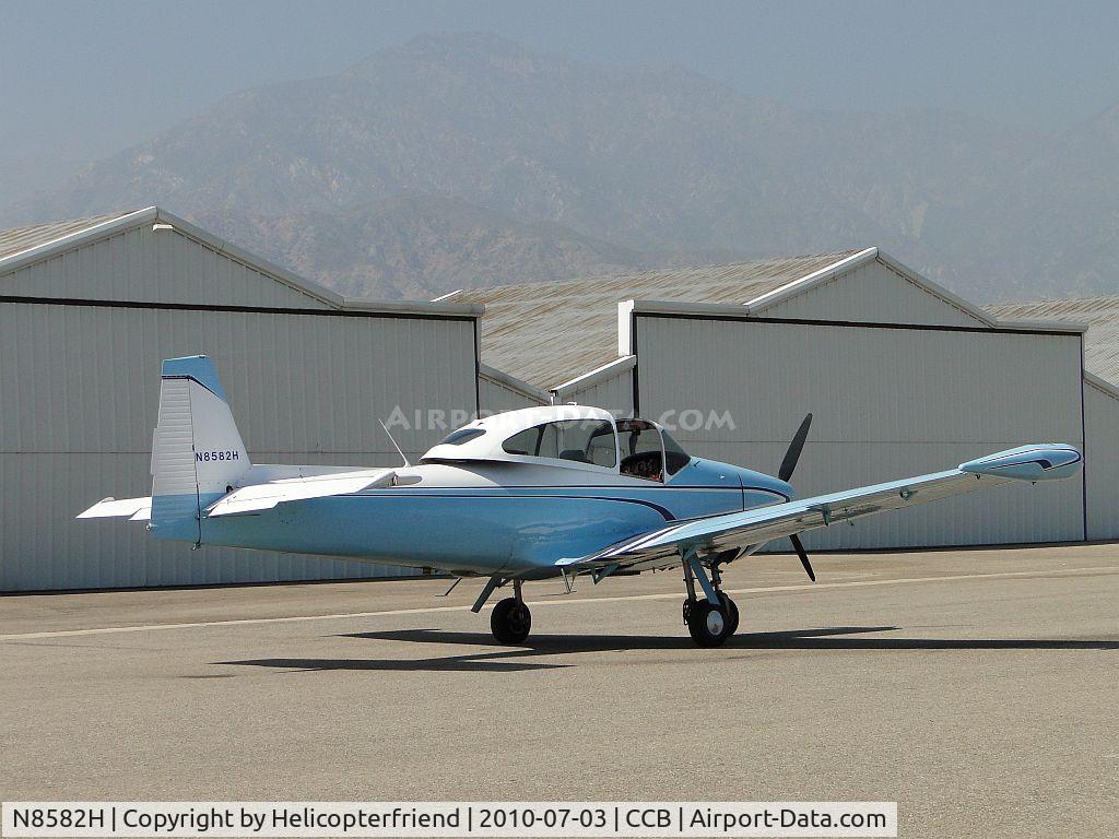 N8582H, 1947 North American Navion (NA-145) C/N NAV-4-557, Parked while visiting a hanger at Cable