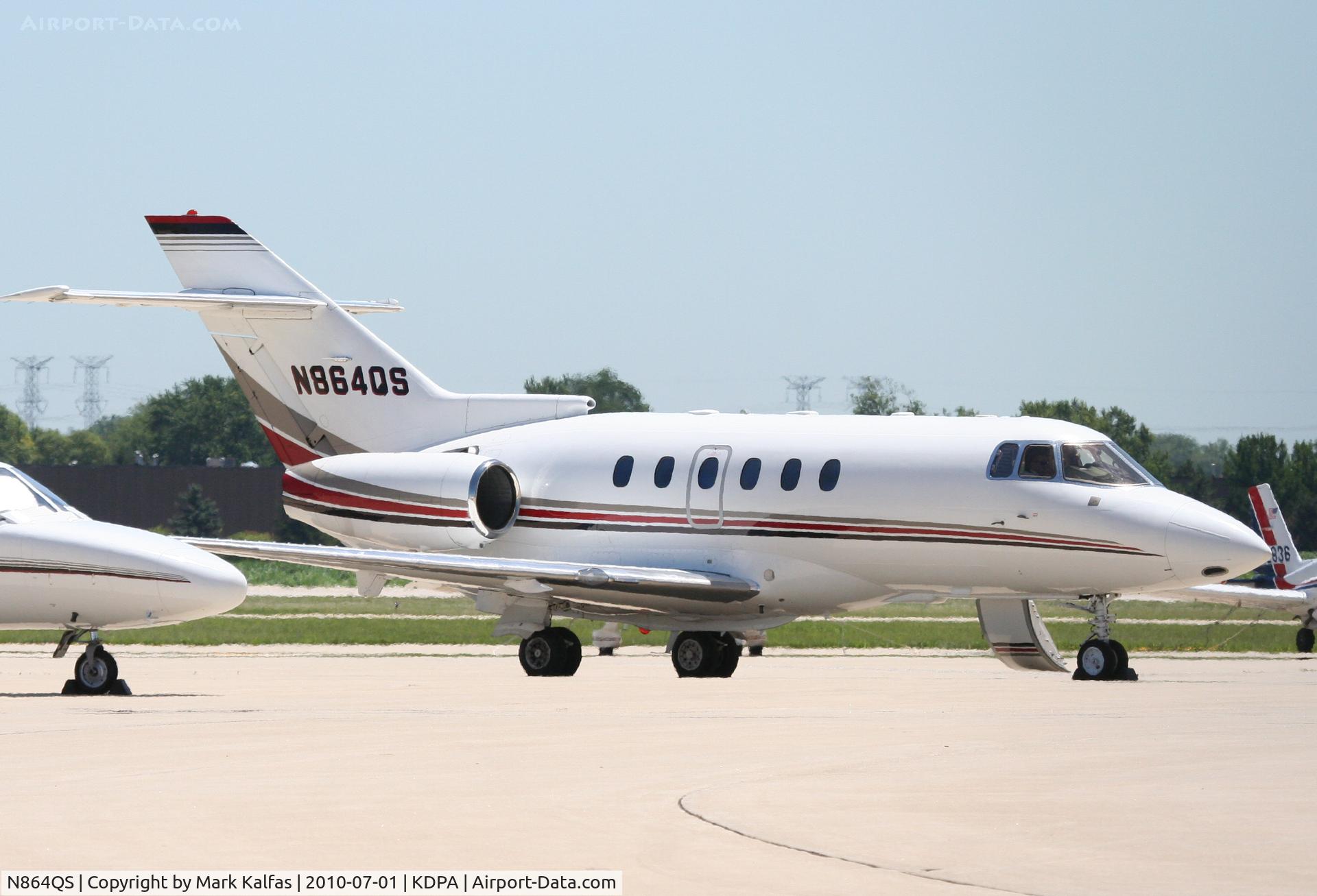 N864QS, 2001 Raytheon Hawker 800XP C/N 258564, NetJets Raytheon Hawker 800XP-H25B/L N864QS on the ramp KDPA preparing to depart to KTUL.