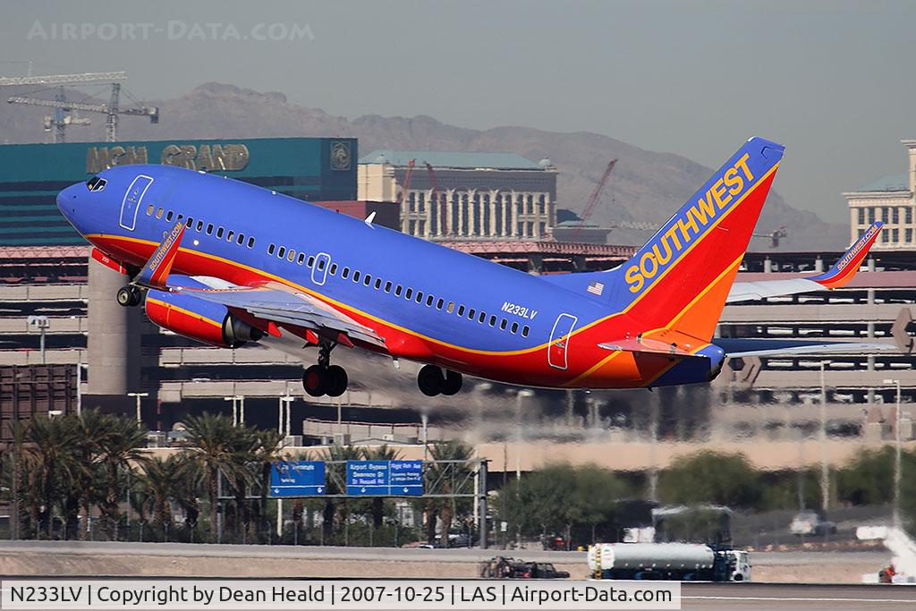 N233LV, 2006 Boeing 737-7H4 C/N 32501, Southwest Airlines N233LV (FLT SWA738) departing RWY 25R enroute to Los Angeles Int'l (KLAX).