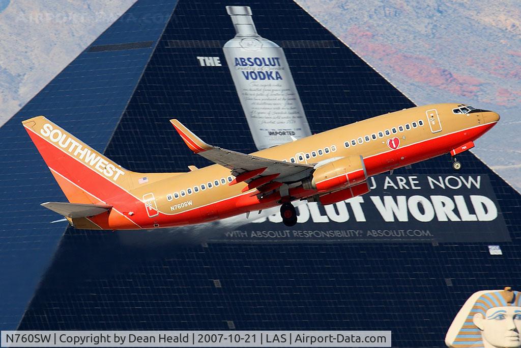 N760SW, 2000 Boeing 737-7H4 C/N 27874, Southwest Airlines N760SW (FLT SWA624) passes in front of the Luxor Hotel & Casino while climbing out from RWY 1R enroute to Port Columbus Int'l (KCMH).