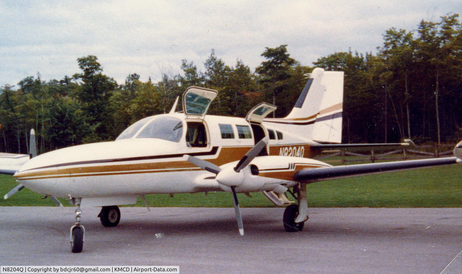 N8204Q, Cessna 402B C/N 402B0384, N8204Q at Mackinac Island Airport (KMCD) 1980.