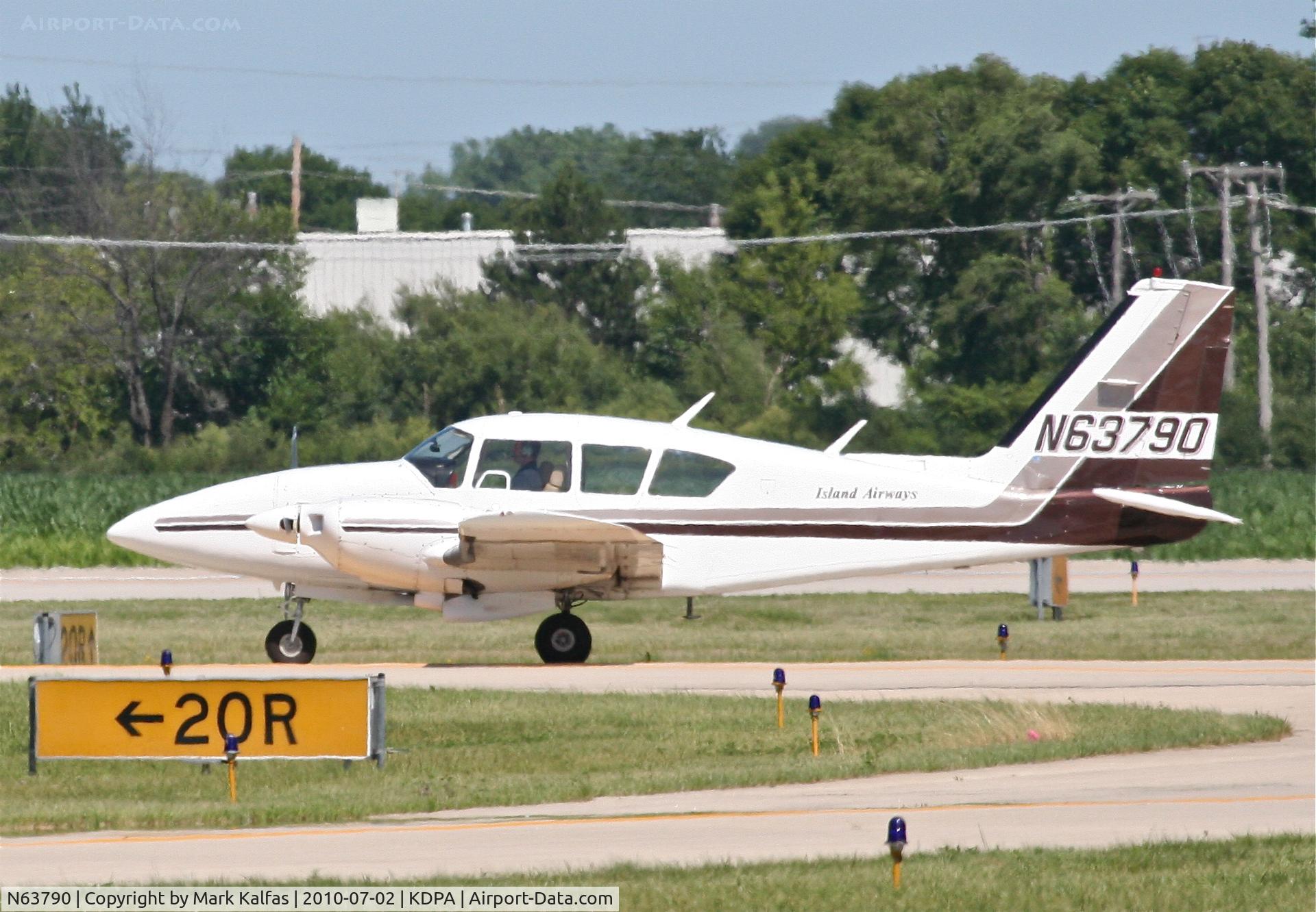 N63790, 1977 Piper PA-23-250 C/N 27-7754117, MCPHILLIPS FLYING SERVICE INC/island Airways Piper PA27 Aztec, N63790 arriving KPDA RWY 20R at taxiway W.