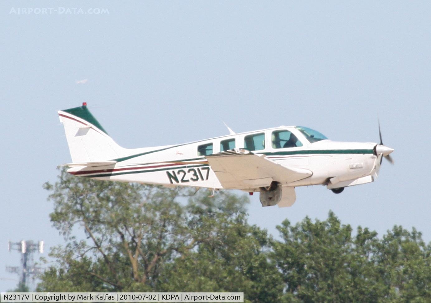 N2317V, 1998 Raytheon Aircraft Company A36 Bonanza C/N E-3164, Beechcraft BE36 Bonanza, N2317V departing RWY 20R KDPA en-route to KRYY.