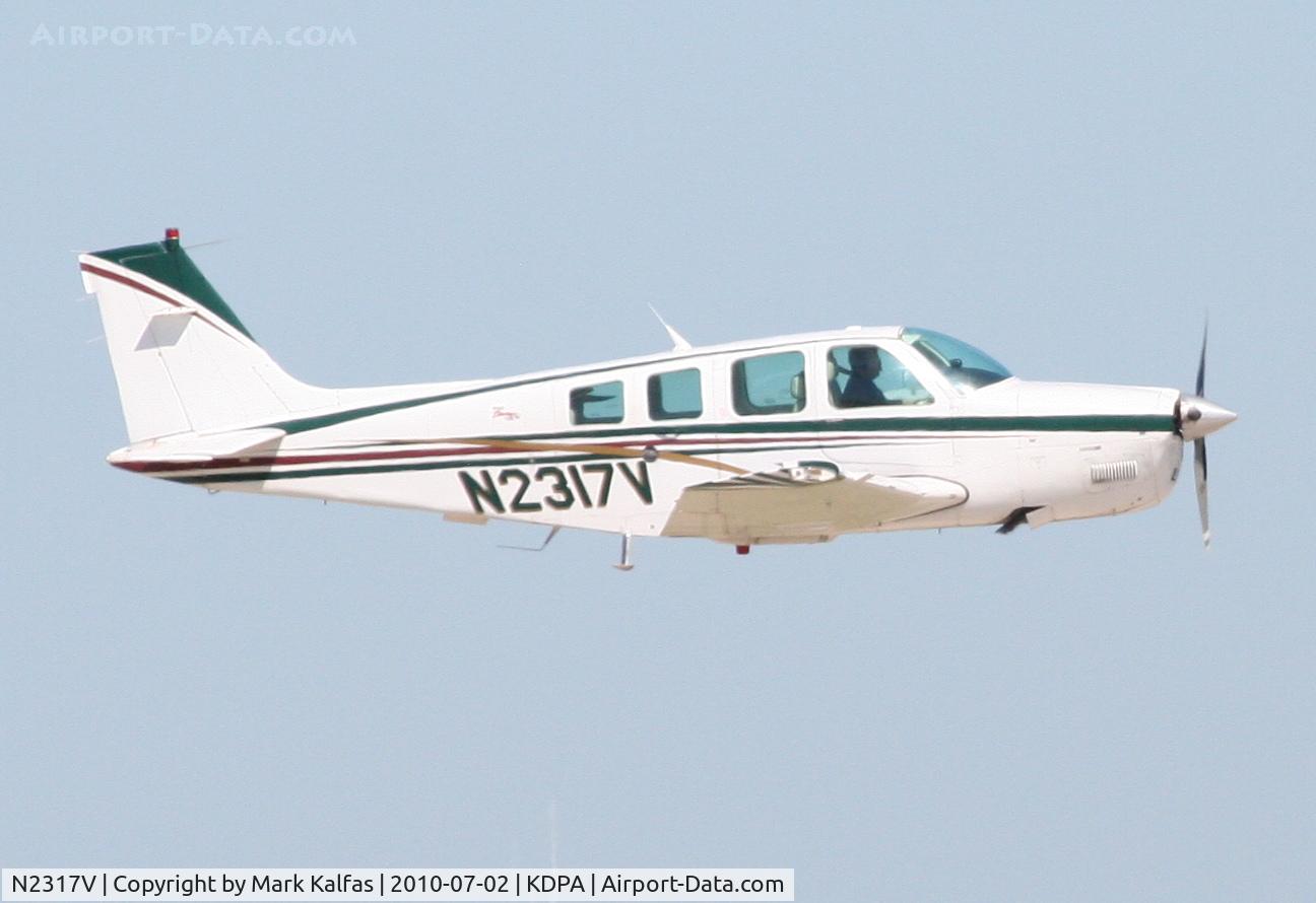 N2317V, 1998 Raytheon Aircraft Company A36 Bonanza C/N E-3164, Beechcraft BE36 Bonanza, N2317V departing RWY 20R KDPA en-route to KRYY.