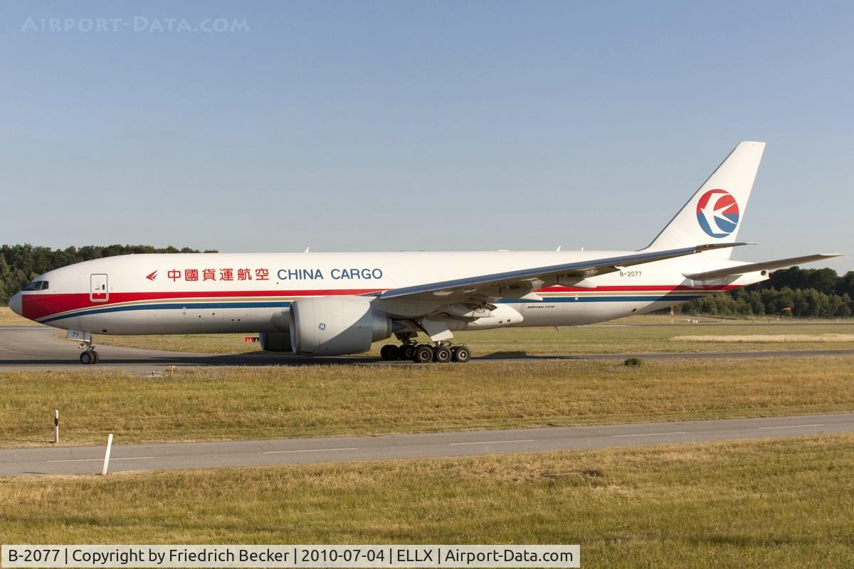 B-2077, 2010 Boeing 777-F6N C/N 37713, taxying to the active