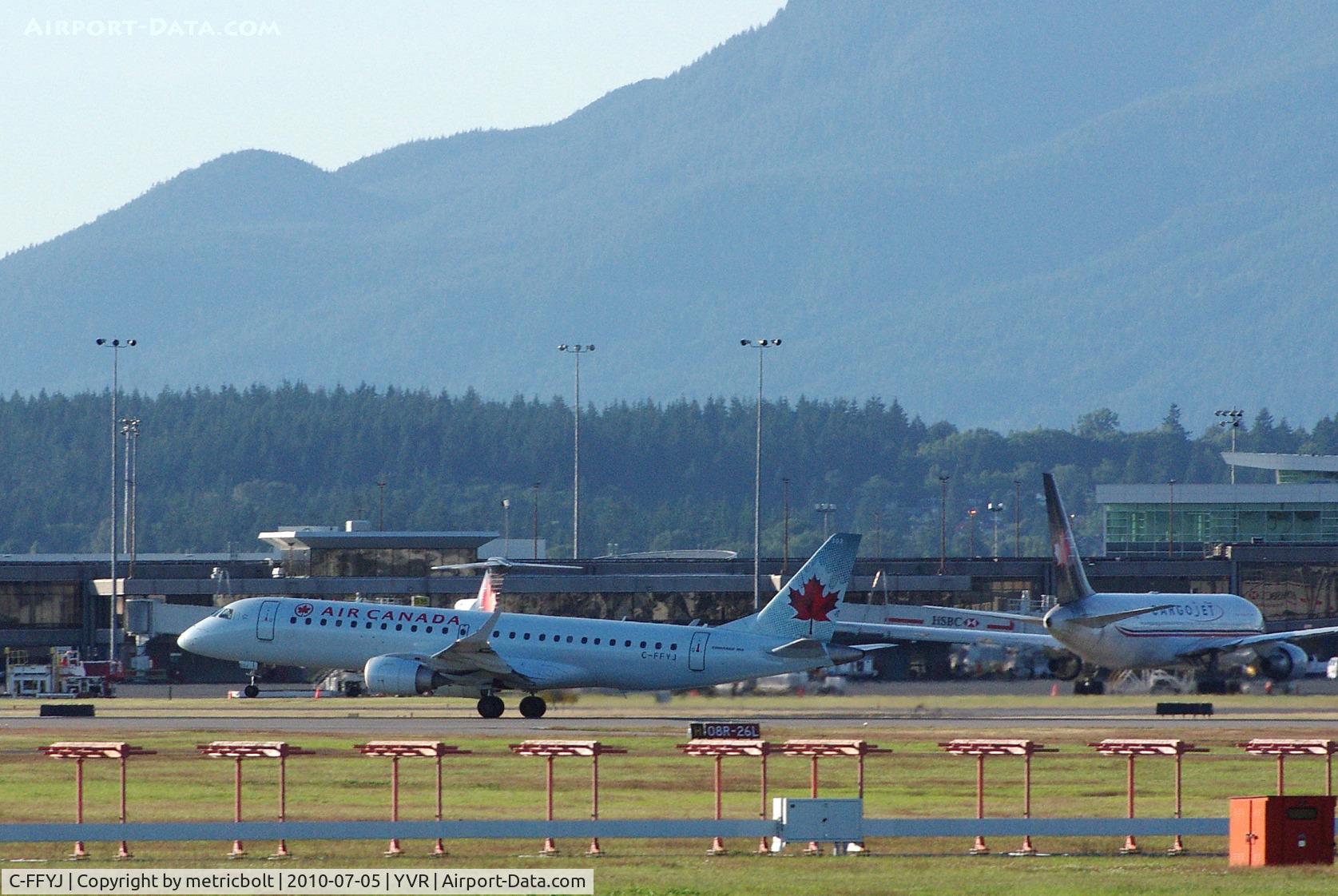 C-FFYJ, 2005 Embraer 190AR (ERJ-190-100IGW) C/N 19000013, Evening departure from YVR