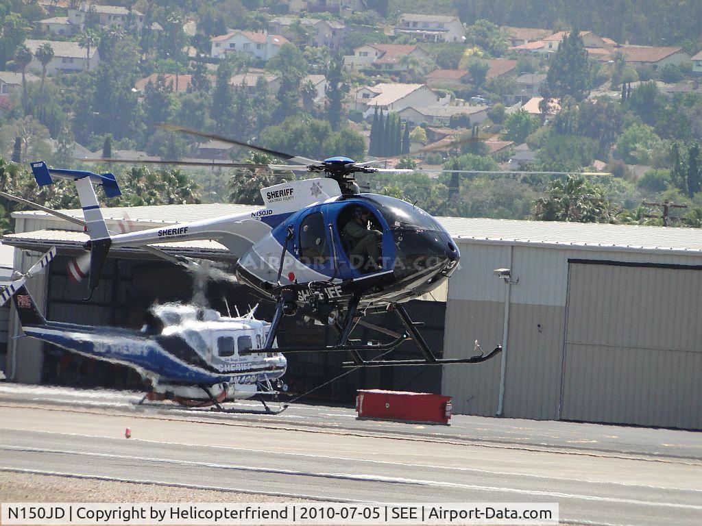 N150JD, 2000 MD Helicopters 369FF C/N 0710FF, Flaring, getting ready to turn into the wind for take off runway 17