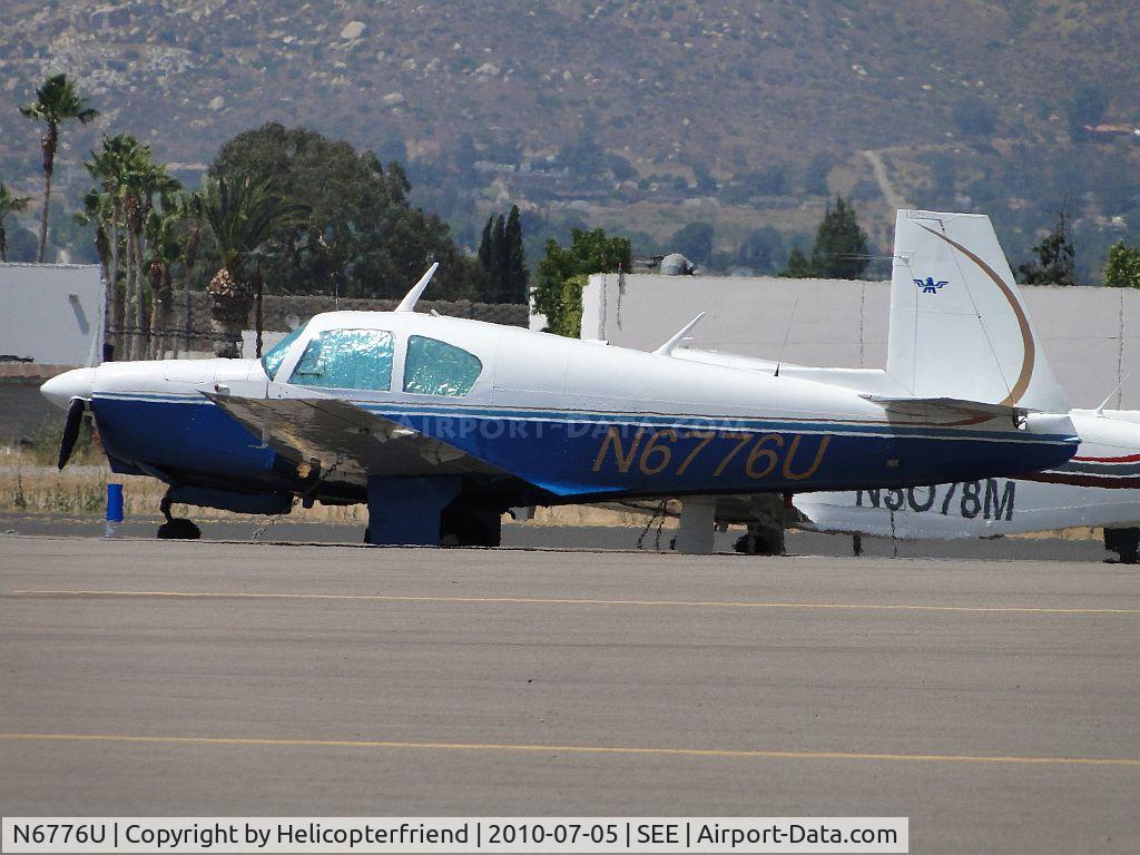 N6776U, 1963 Mooney M20C Ranger C/N 2498, Parked and covered up from the sun on the westside