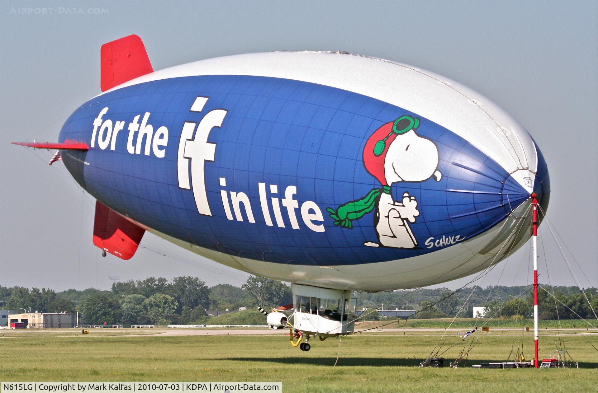 N615LG, 1997 American Blimp Corp A60R C/N 015, Lightship Group, American Blimp Corp A60R operating for MetLife as Snoopy Two, N615LG tethered down at KDPA.