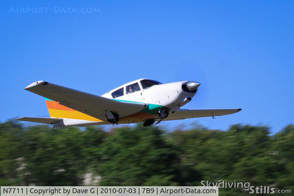 N7711, Piper PA-24 Comanche C/N 24-3397, Piper Comanche departing Ellington, CT
