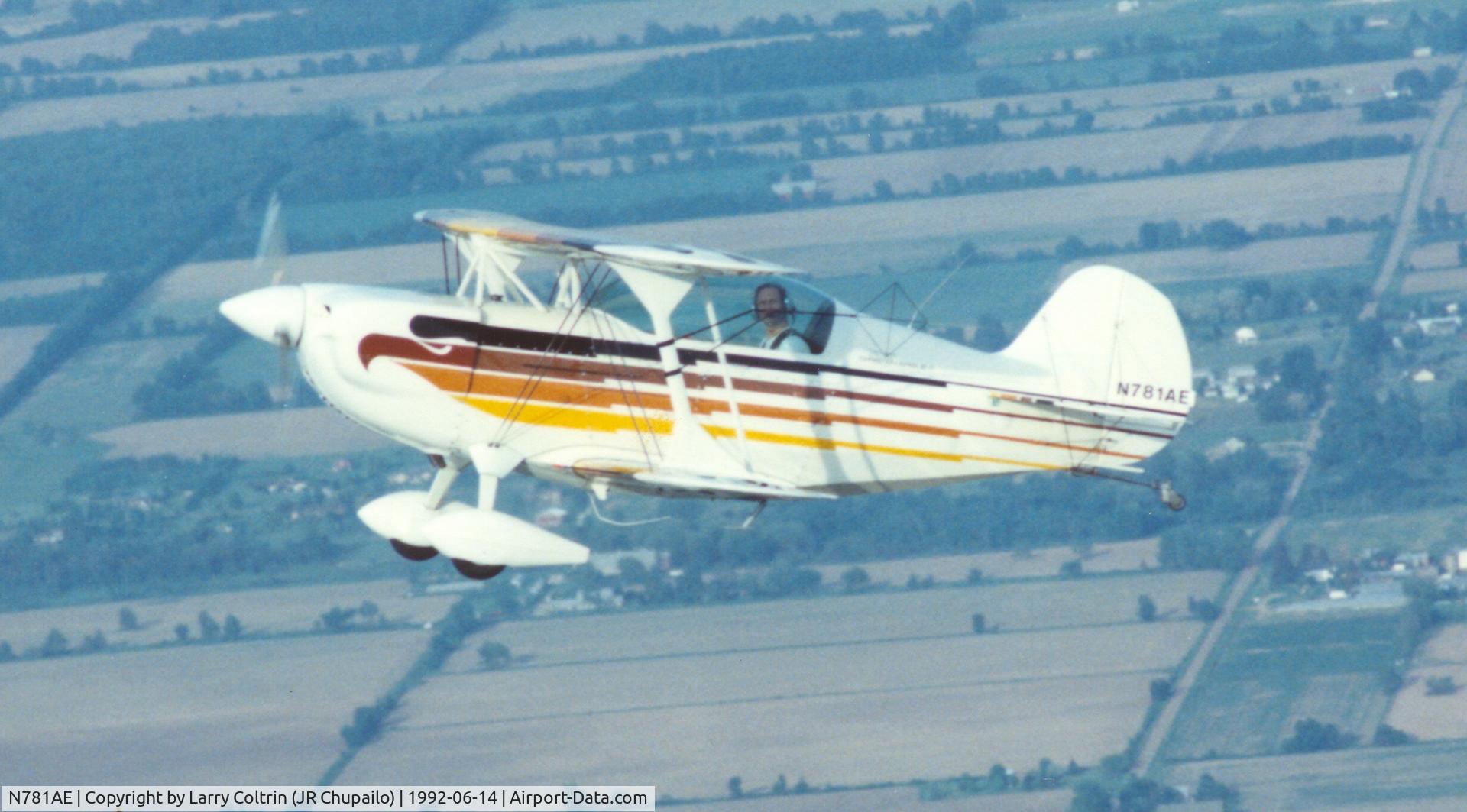 N781AE, 1982 Christen Eagle II C/N TOMLINSON-0001, N781AE taken inflight June 1992. Somewhere over Central Illinois enroute to Chicago after a acro contest in Salem IL.