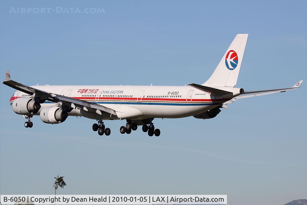 B-6050, 2002 Airbus A340-642 C/N 468, China Eastern B-6050 seconds from landing on RWY 24R.