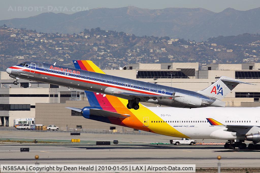 N585AA, 1991 McDonnell Douglas MD-82 (DC-9-82) C/N 53248, American Airlines N585AA (FLT AAL2440) departing RWY 25R enroute to Dallas/Fort Worth Int'l (KDFW) with Air Pacific DQ-FJL taxiing in the background.