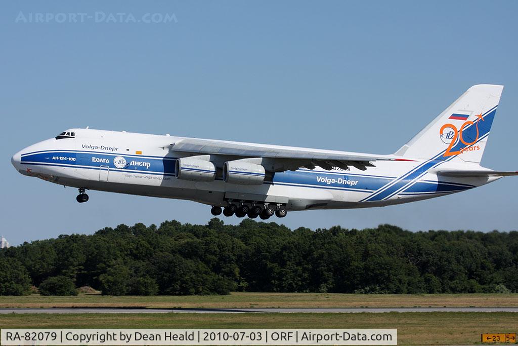RA-82079, 2000 Antonov An-124-100 Ruslan C/N 9773052062157/0801, Volga Dnepr RA-82079 (FLT VDA1318) departing RWY 5 enroute to Newark Liberty Int'l (KEWR), ultimately headed to Helsinki, Poland. The 20 Years logo on the tail is a newly added feature of this aircraft.