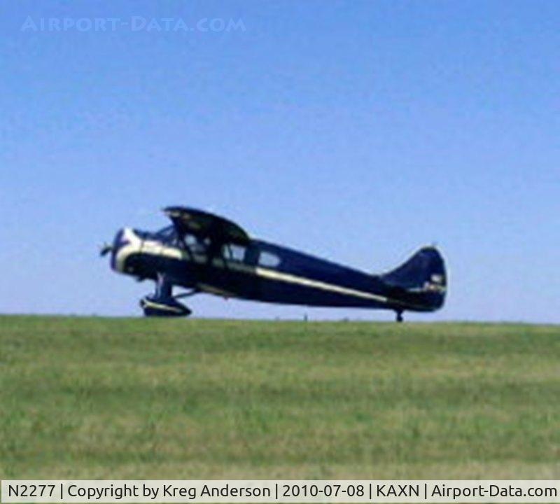 N2277, 1936 Waco ZQC-6 C/N 4446, WACO ZQC-6 holding short for runway 31. Sorry for the photo, it's off a cell phone.