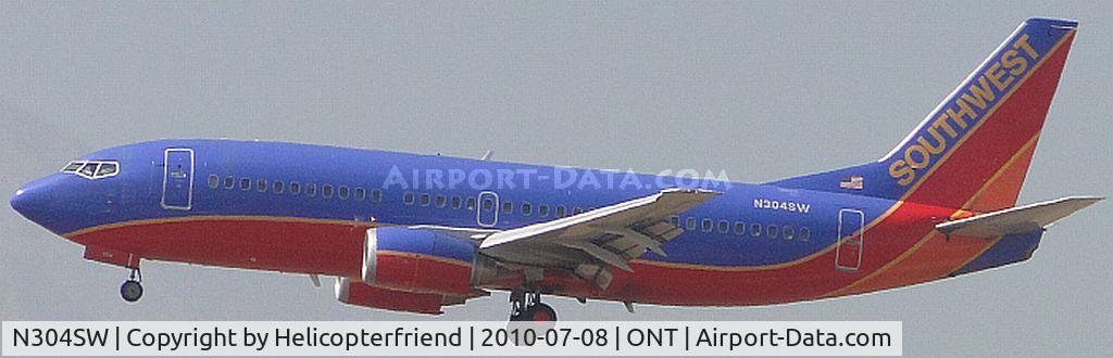 N304SW, 1985 Boeing 737-3H4 C/N 22944, On final to 26L