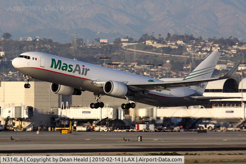 N314LA, 2001 Boeing 767-316F C/N 32573, Mas Air N314LA departing RWY 25R, now with winglets.