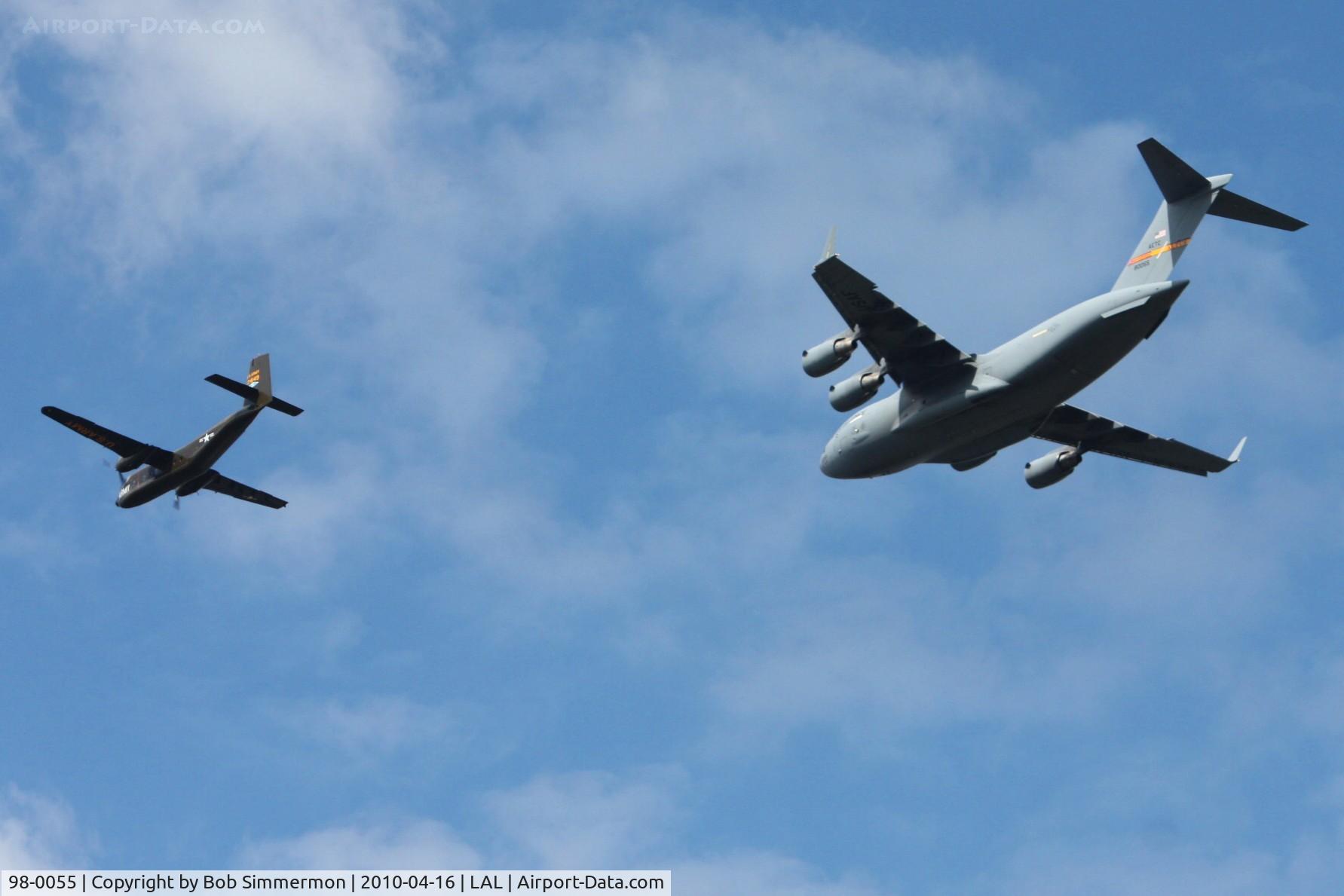 98-0055, 1998 Boeing C-17A Globemaster III C/N F-58/P-55, Overflying Sun N Fun 2010 w/Dehavilland Caribou N149HF.