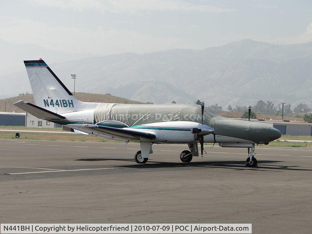 N441BH, Cessna 441 C/N 441-0145, Covered from head to half way back, tied down and parked near NA1
