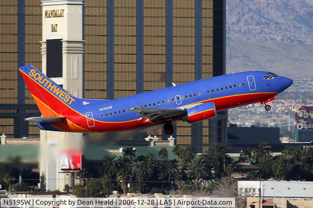 N519SW, 1991 Boeing 737-5H4 C/N 25318, Southwest Airlines N519SW (FLT SWA37) climbing out from RWY 1R, in front of Mandalay Bay, enroute to El Paso Int'l (KELP). It was nice to see one of the 25 737-500s in Southwest's fleet.