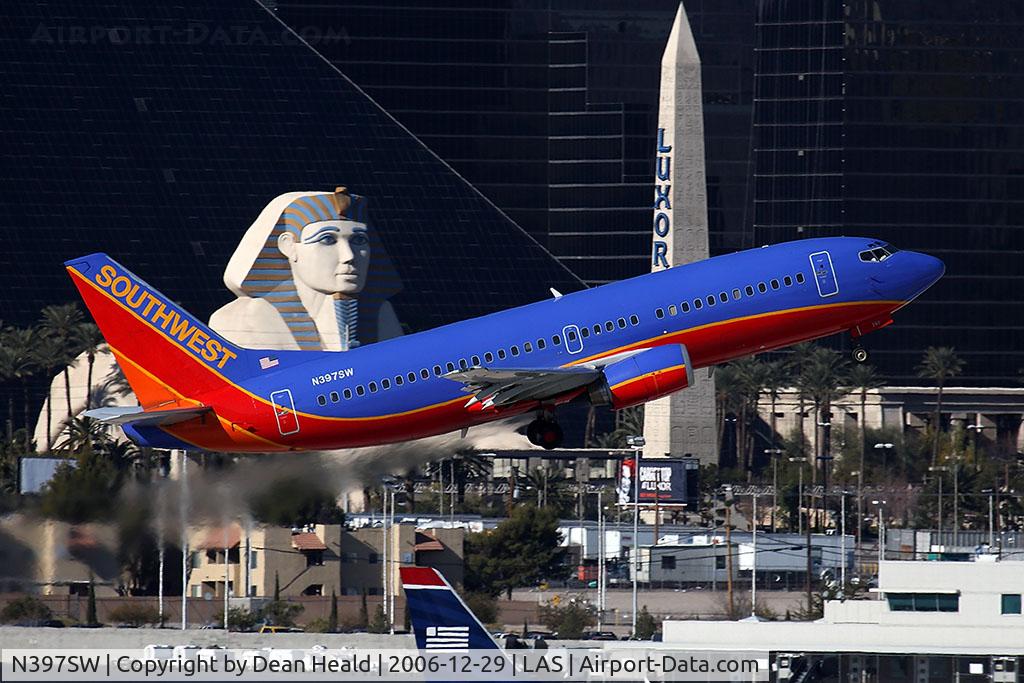 N397SW, 1995 Boeing 737-3H4 C/N 27691, Southwest Airlines N397SW (FLT SWA1377) climbing out from RWY 1R with the Luxor Sphynx in the background, enroute to Los Angeles Int'l (KLAX).