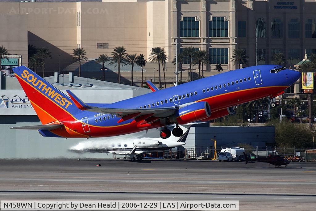 N458WN, 2004 Boeing 737-7H4 C/N 33857, Southwest Airlines N458WN (FLT SWA772) climbing out from RWY 1R enroute to Birmingham Int'l (KBHM).