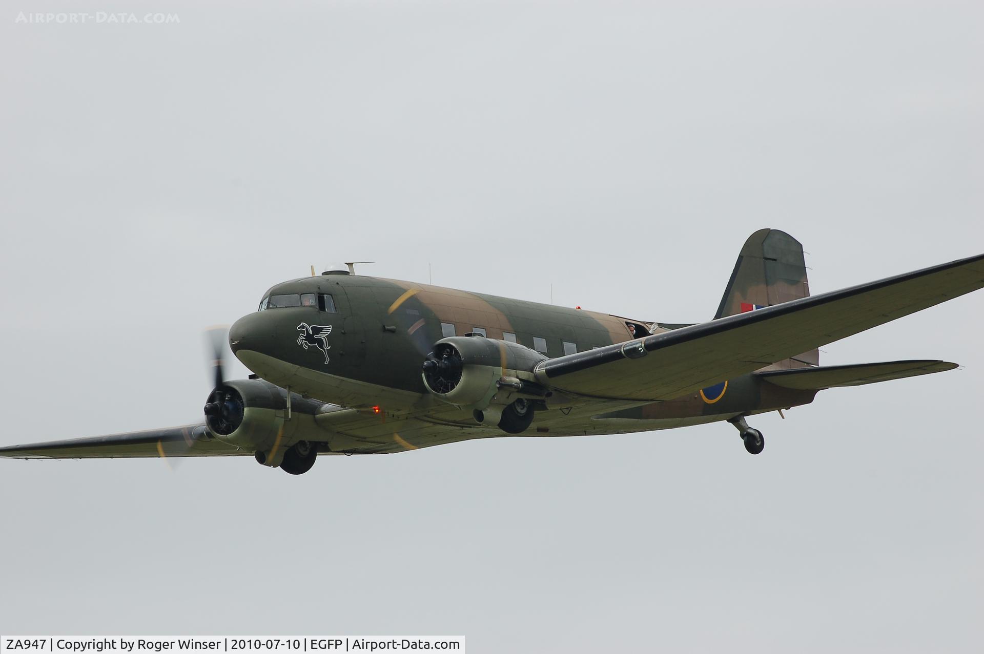 ZA947, 1943 Douglas C-47A-60-DL Dakota III C/N 10200, In the markings of 267 Squadron RAF. Low pass over Pembrey Airport after displaying at the nearby Kidwelly Carnival.
