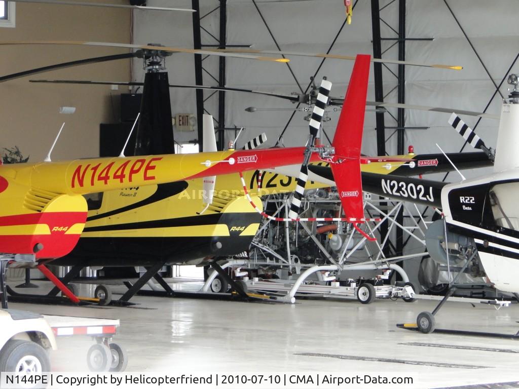 N144PE, 2008 Robinson R44 II C/N 12183, Parked in a hanger full of Robinso Helicopters