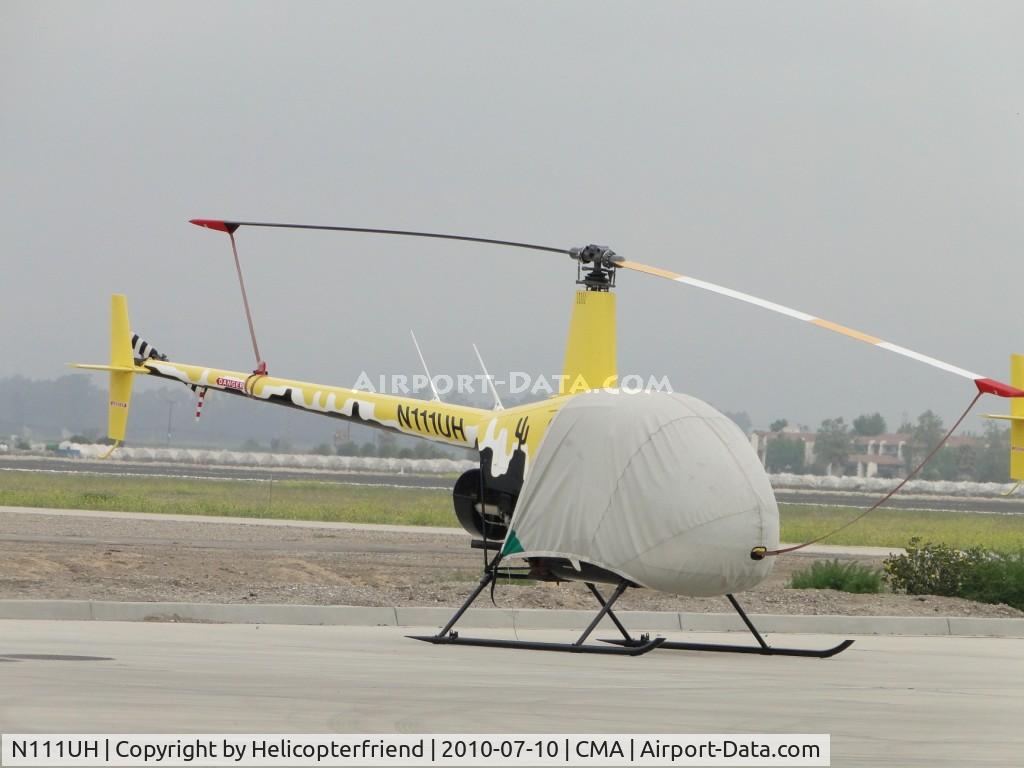 N111UH, 2004 Robinson R22 BETA C/N 3750, Parked, covered and rotors tied down