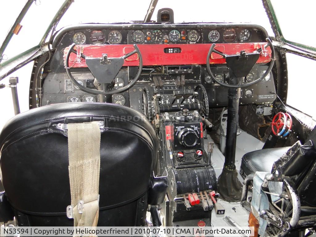 N53594, 1944 Curtiss C-46F Commando C/N 22486, Cockpit area, yoke is immobilized by a wooden barricade