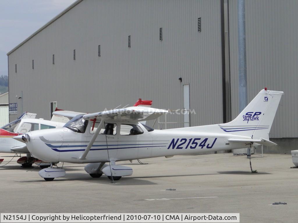 N2154J, 2003 Cessna 172S C/N 172S9451, Tied down and parked on the eastside
