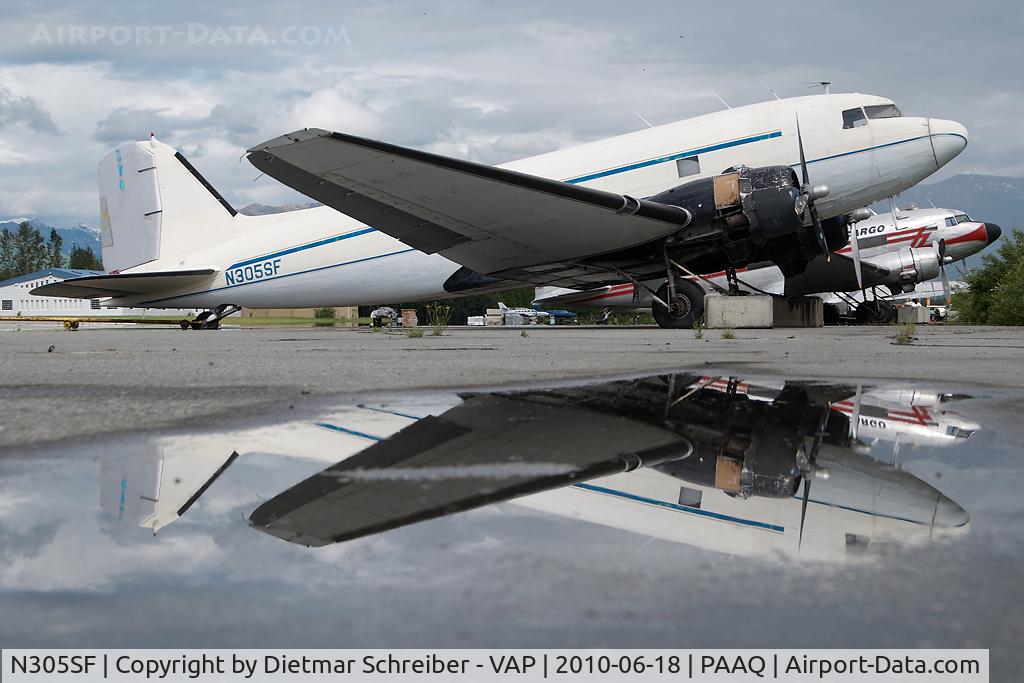 N305SF, 1944 Douglas DC-3C C/N 6208, Bush Air Cargo DC3 - reflection