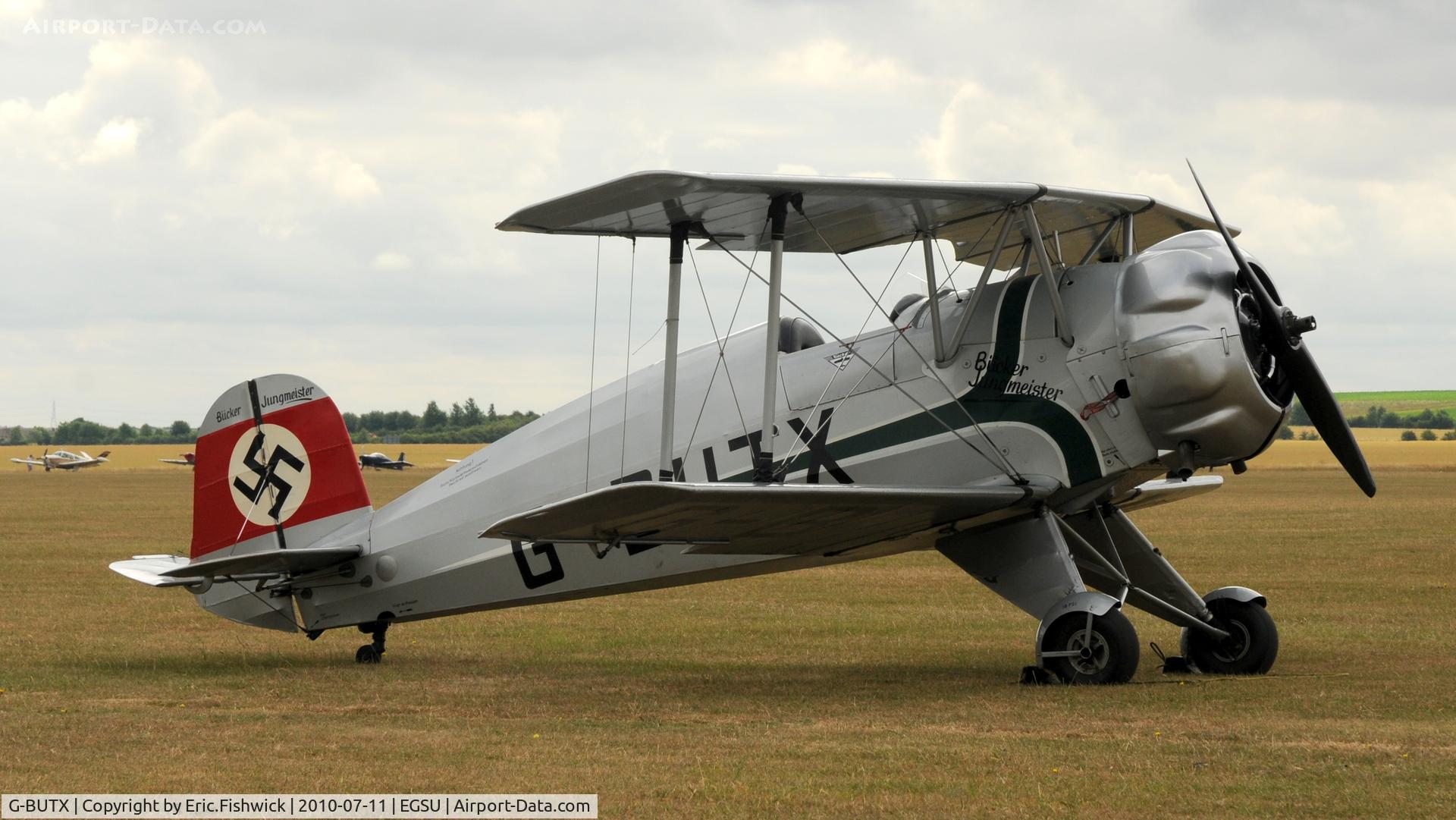 G-BUTX, 1940 Bucker Bu-133C Jungmeister C/N ES.1-4, 3. G-BUTX at Duxford Flying Legends Air Show July 2010