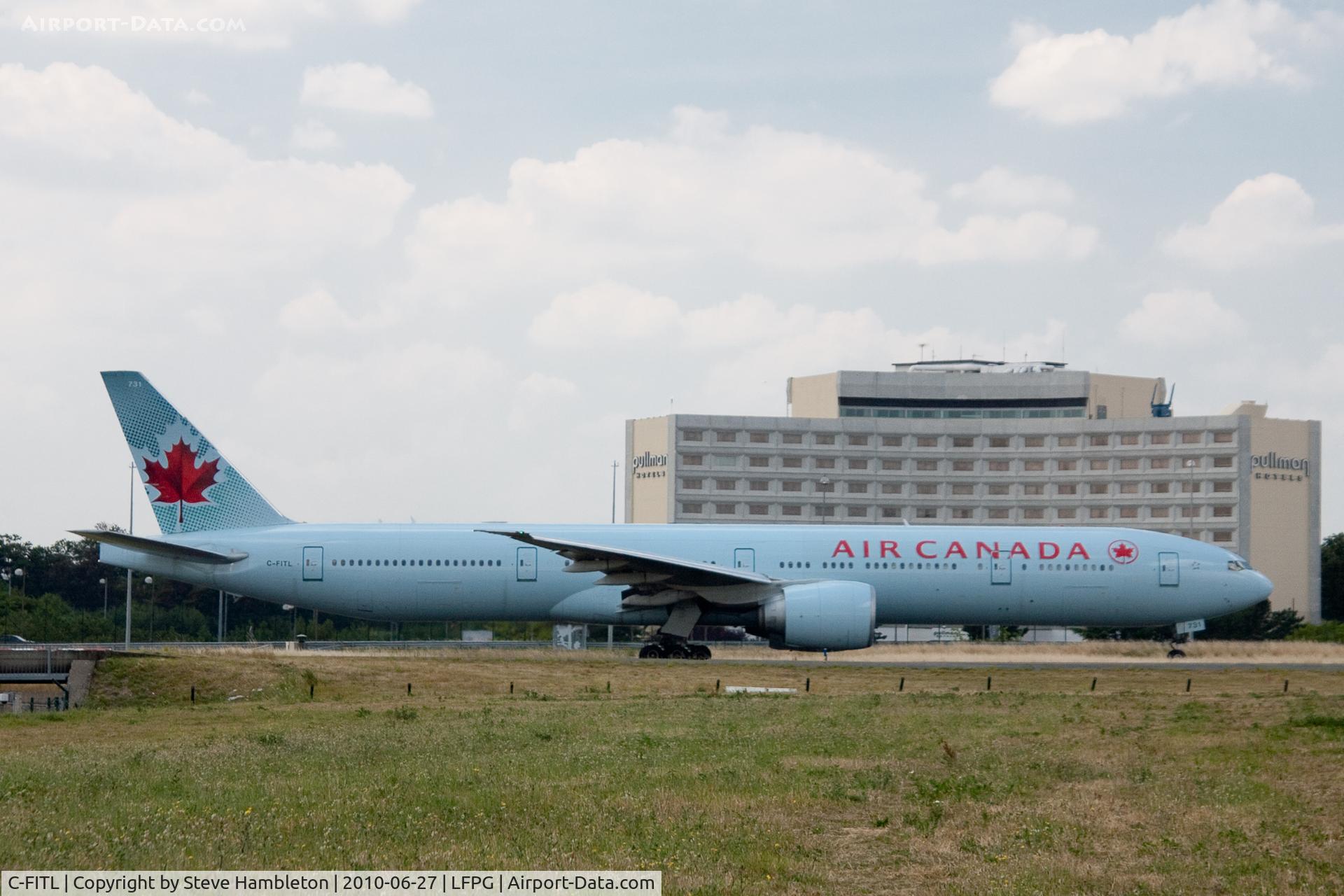 C-FITL, 2007 Boeing 777-333/ER C/N 35256, From the 'Mound' at Paris Charles-de-Gaulle
