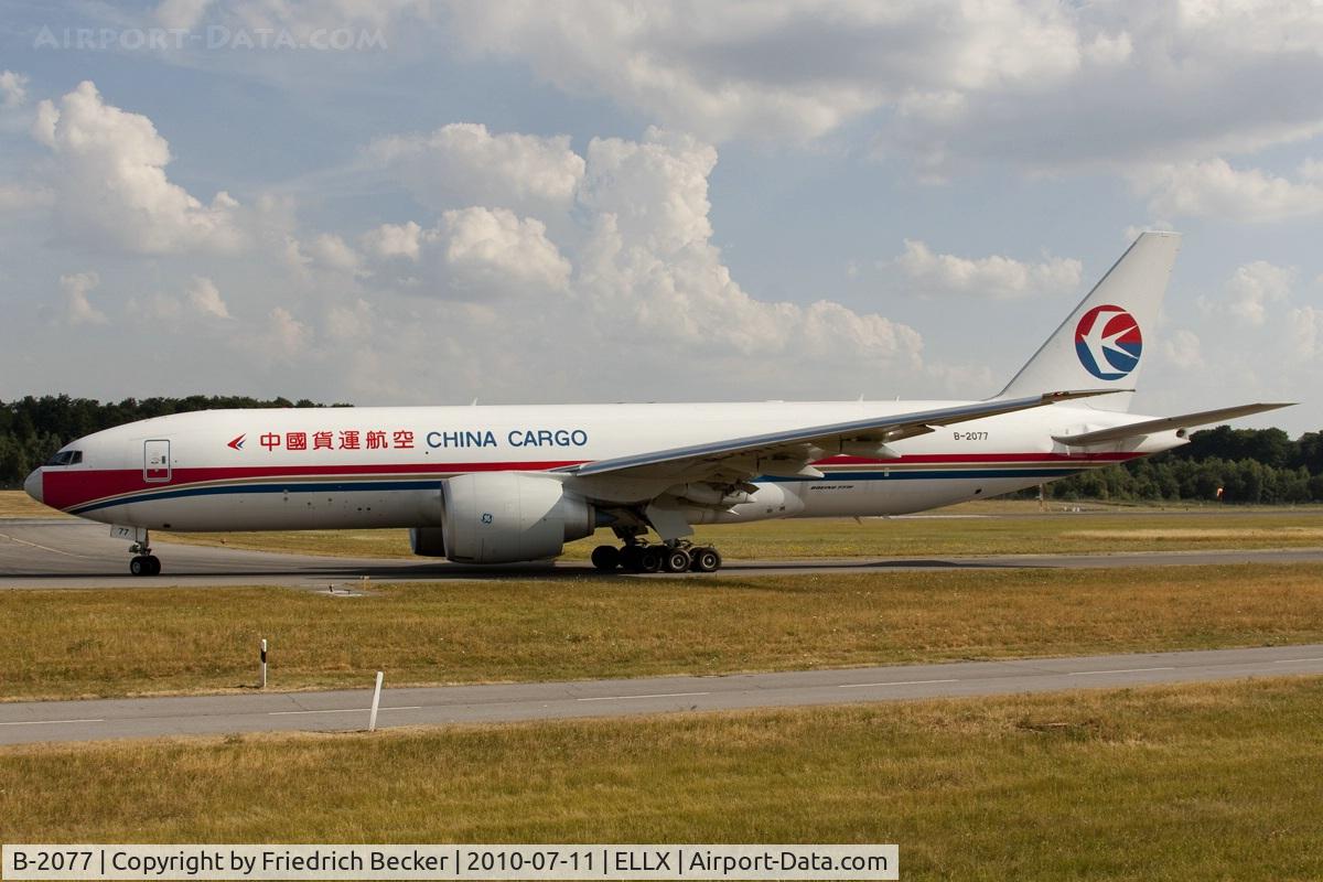 B-2077, 2010 Boeing 777-F6N C/N 37713, taxying to the active