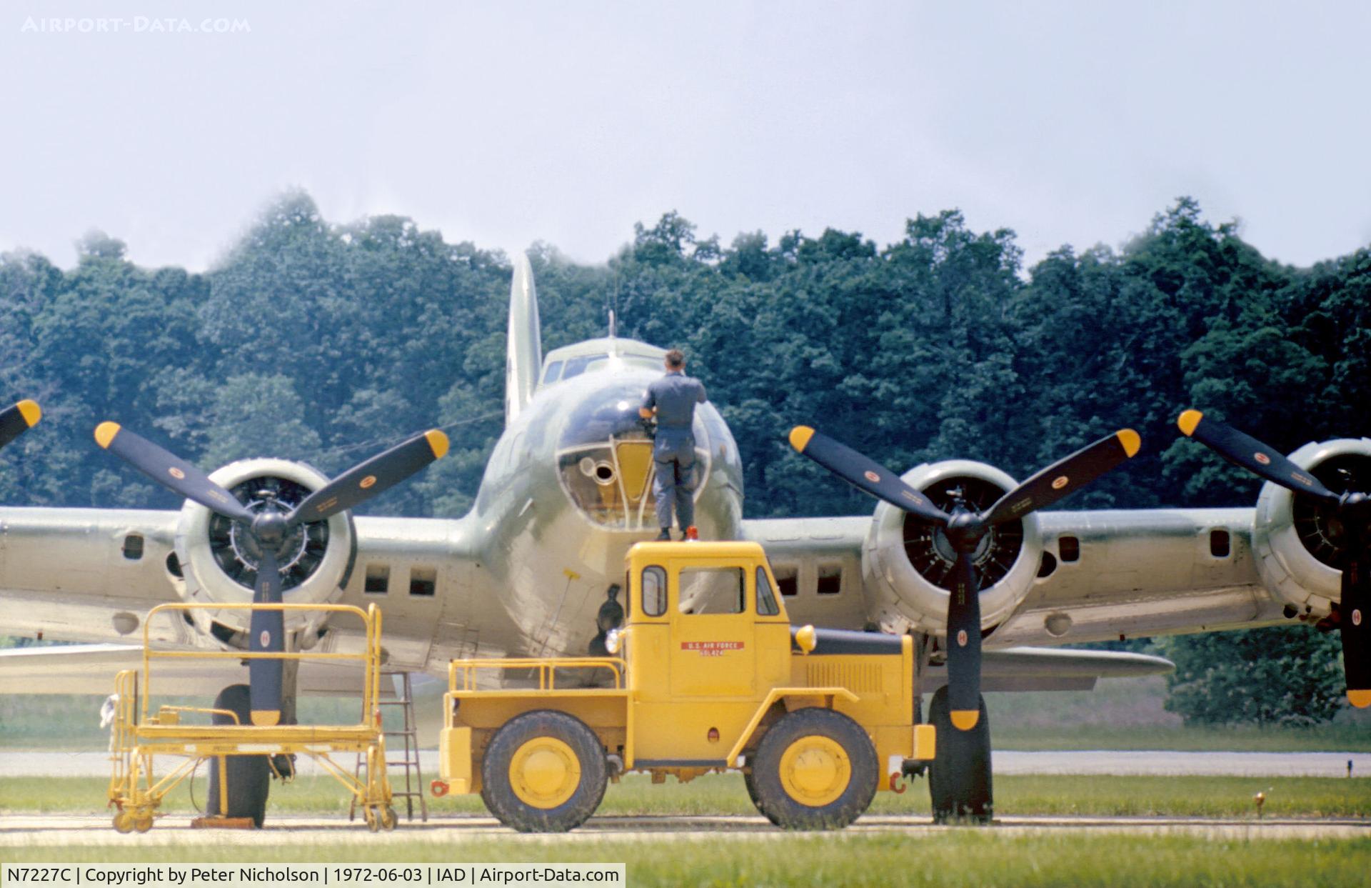 N7227C, 1944 Boeing B-17G Fortress C/N 32513, B-17G of the Confederate Air Force receiving loving care and attention at Transpo 72 at Dulles Intnl Airport in June 1972.
