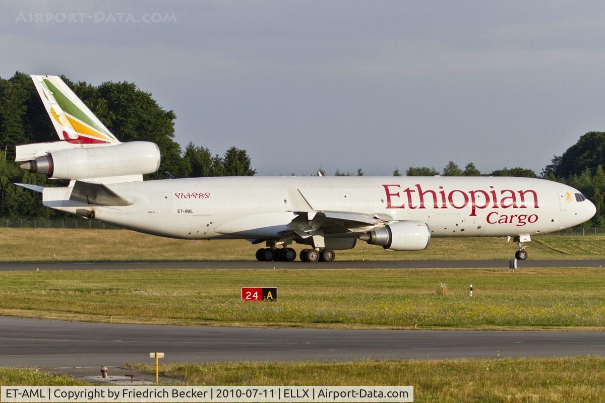 ET-AML, 1997 McDonnell Douglas MD-11F C/N 48758, departing via RW24