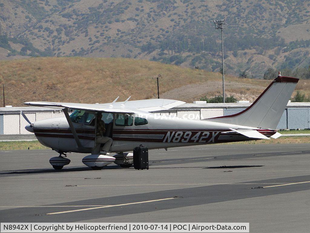 N8942X, 1961 Cessna 182D Skylane C/N 18253342, Parked in transient parking and unloading gear
