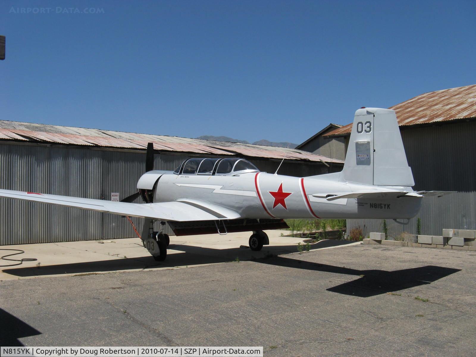 N815YK, 1987 Nanchang CJ-6A C/N 4432003, 1987 Nanchang China CJ-6A, Vedeneev (Ivchenko) M14P 9 cyl. 360 Hp upgrade with 3-blade prop, our FAA ATC assigns call sign YAK to this aircraft. The CJ-6A has a squared tail, cranked dihedral, flush rivets & fully retractable gear. Not so the Yak 52.