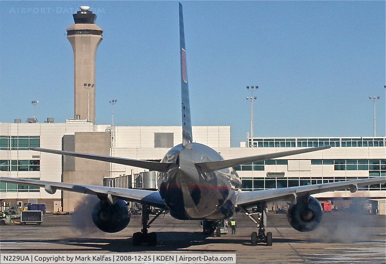 N229UA, 2002 Boeing 777-222 C/N 30557, United Airlines Boeing 777-222, N229UA pushing back from B38 KDEN.