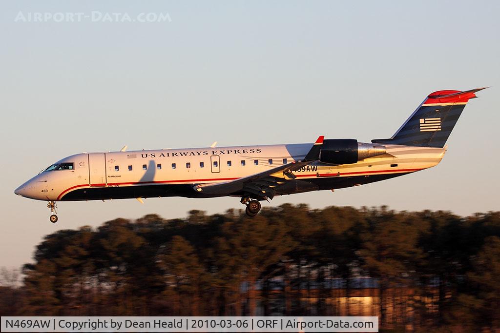 N469AW, 2004 Bombardier CRJ-200LR (CL-600-2B19) C/N 7917, US Airways Express (Air Wisconsin) N469AW (FLT AWI47071) from Reagan National (KDCA) landing RWY 5 late in the day.