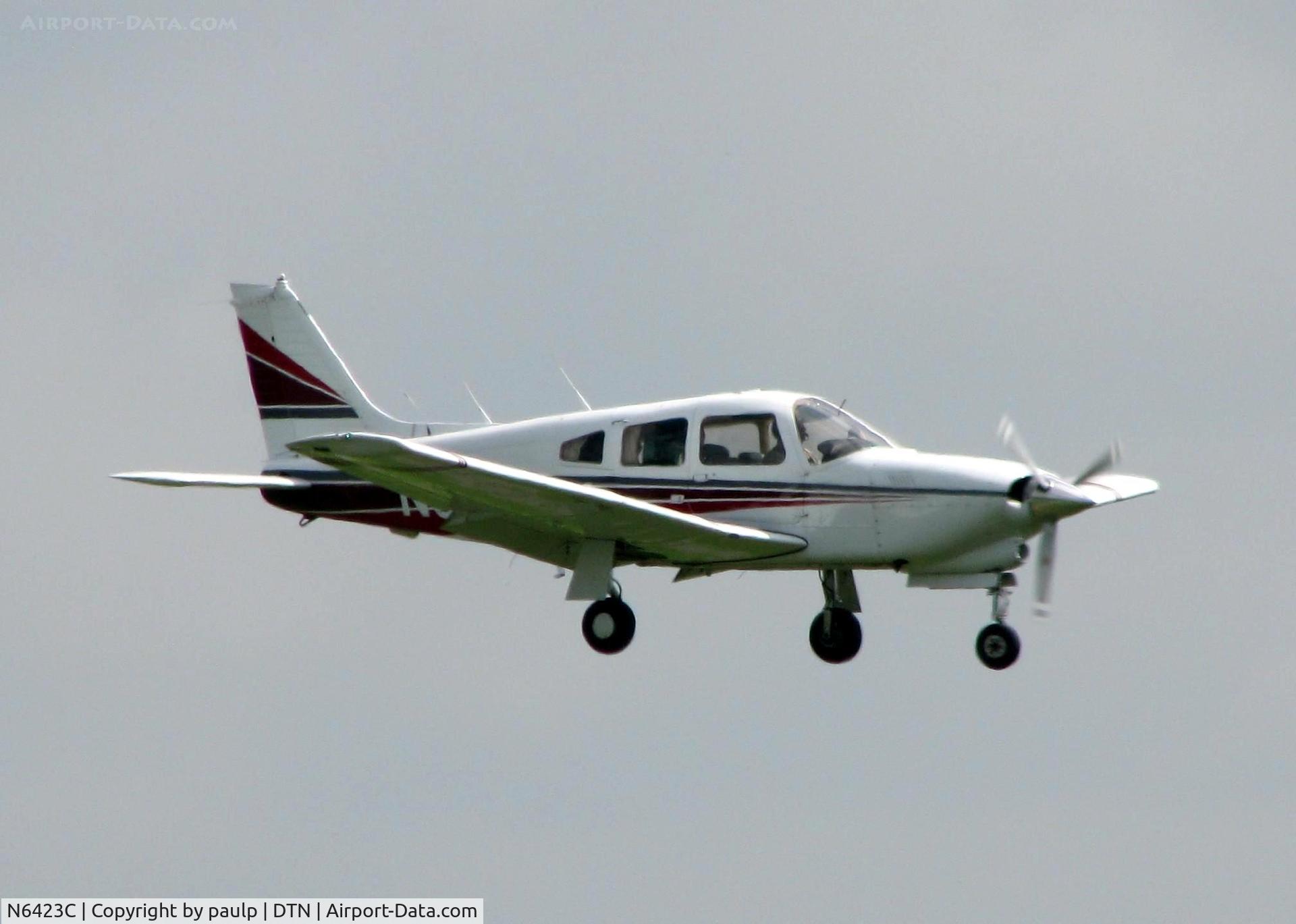 N6423C, 1978 Piper PA-28R-201T Cherokee Arrow III C/N 28R-7803229, Landing at Shreveport's Downtown Airport.