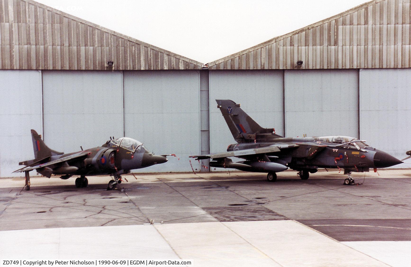 ZD749, 1984 Panavia Tornado GR.1 C/N 384/BS130/3177, Tornado GR.1 of the Strike Attack Operational Evaluation Unit (SAOEU) on the flight-line of the 1990 Boscombe Down Battle of Britain 50th Anniversary Airshow with Harrier T.4 XW 267.