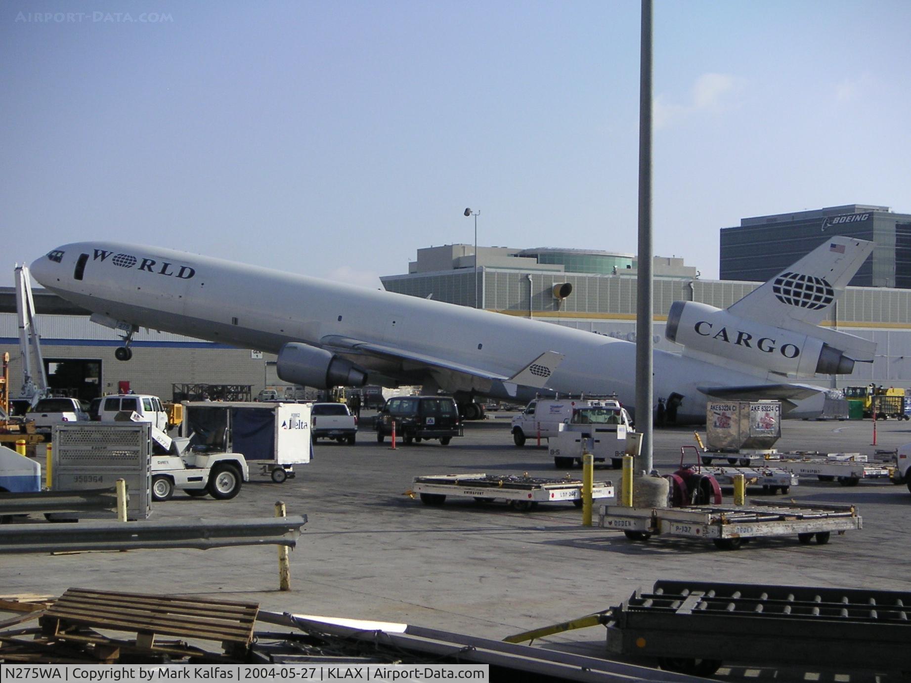 N275WA, 1995 McDonnell Douglas MD-11CF C/N 48631, World Airways Mcdonnell Douglas MD-11F, N275WA on the cargo ramp KLAX with a weight and balance issue.