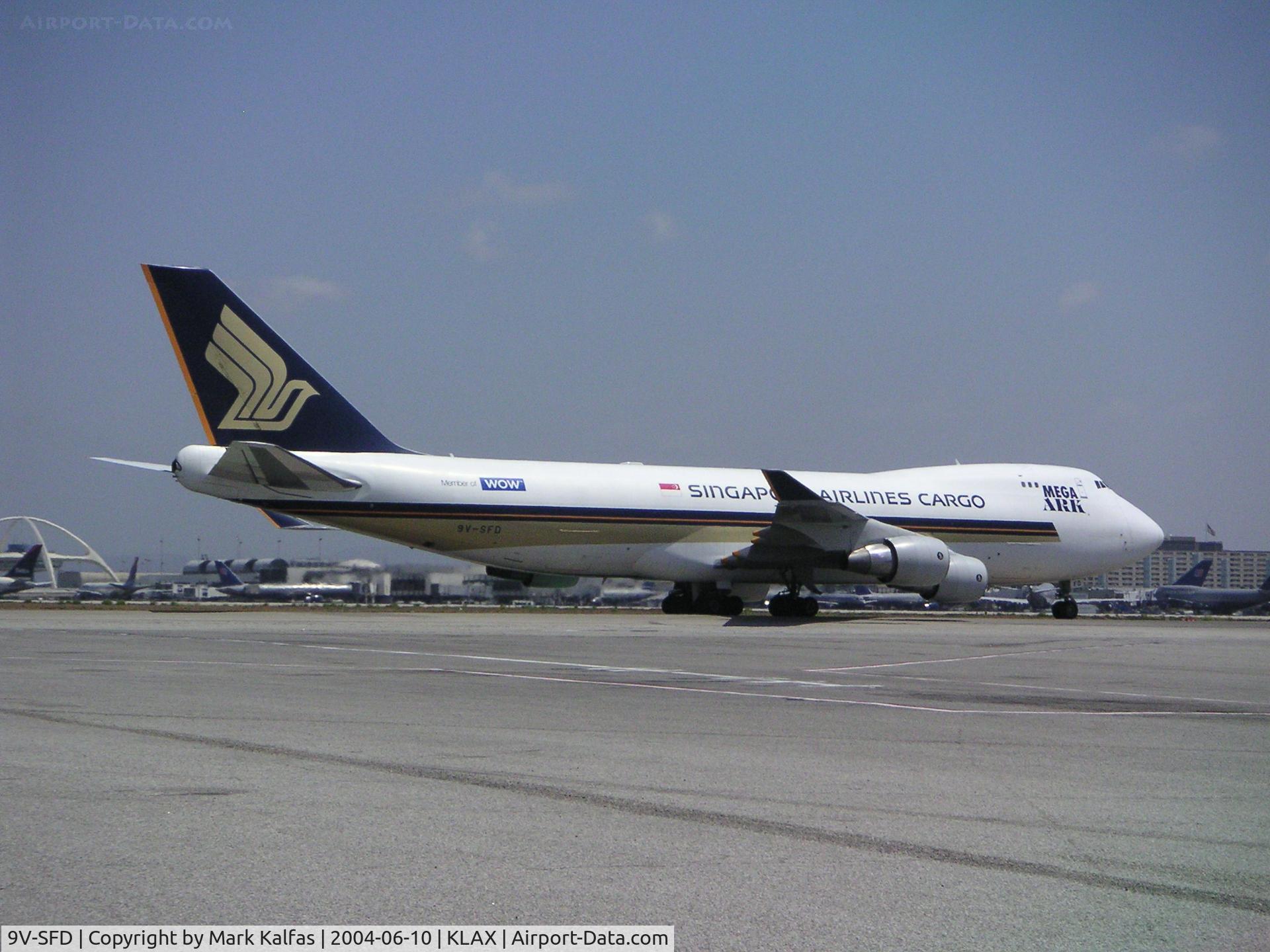 9V-SFD, 1995 Boeing 747-412F/SCD C/N 26553, Singapore Airlines Cargo Boeing 747-412F, 9V-SFD taxing to the Singapore cargo ramp KLAX.