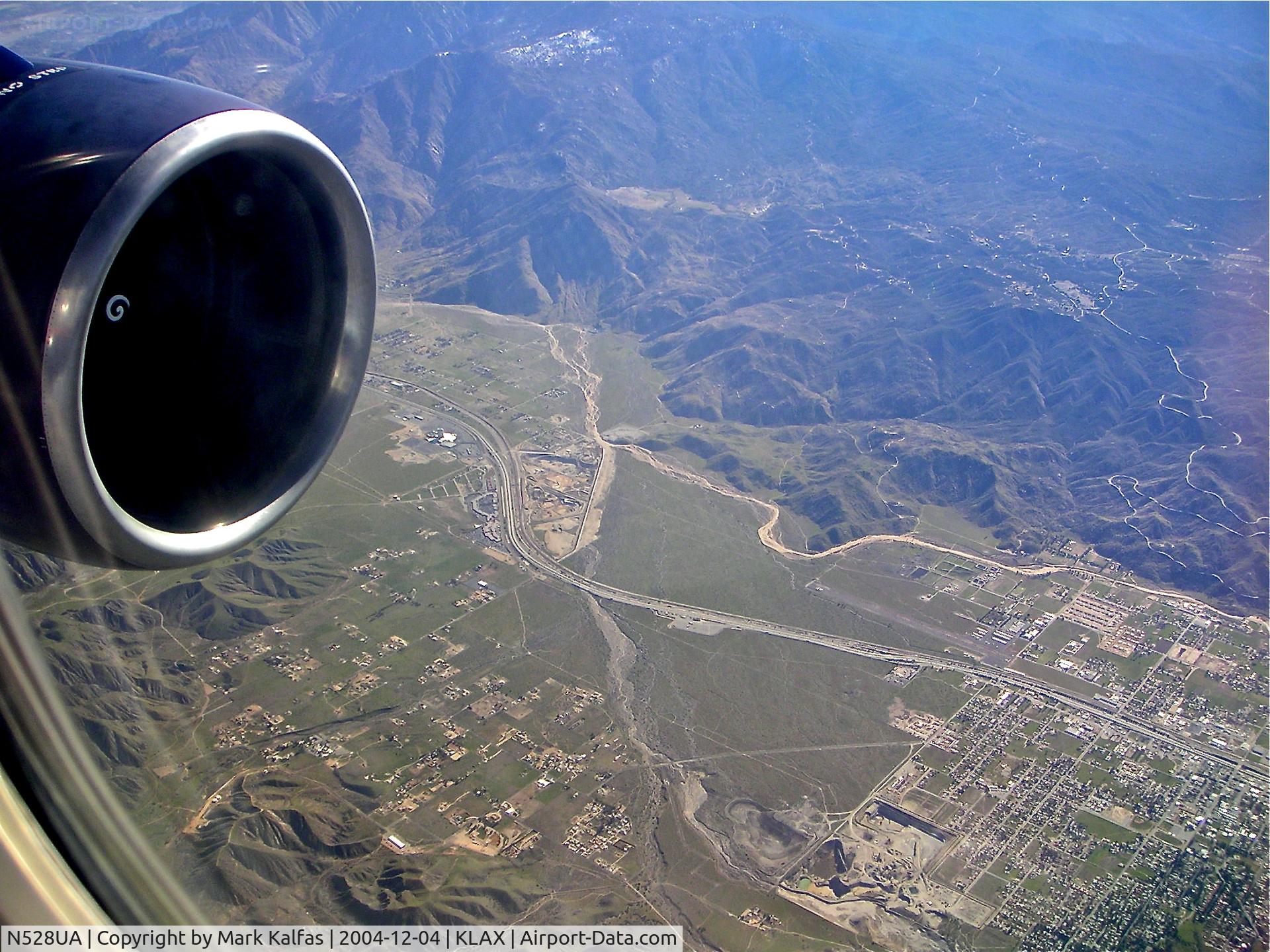 N528UA, 1991 Boeing 757-222 C/N 25018, United Airlines Boeing 757-222, N528UA on the CIVIT 5 Arrival KLAX, crossing over the Banning pass (with the Morongo Casino under the engine) on a trip from KBOS.