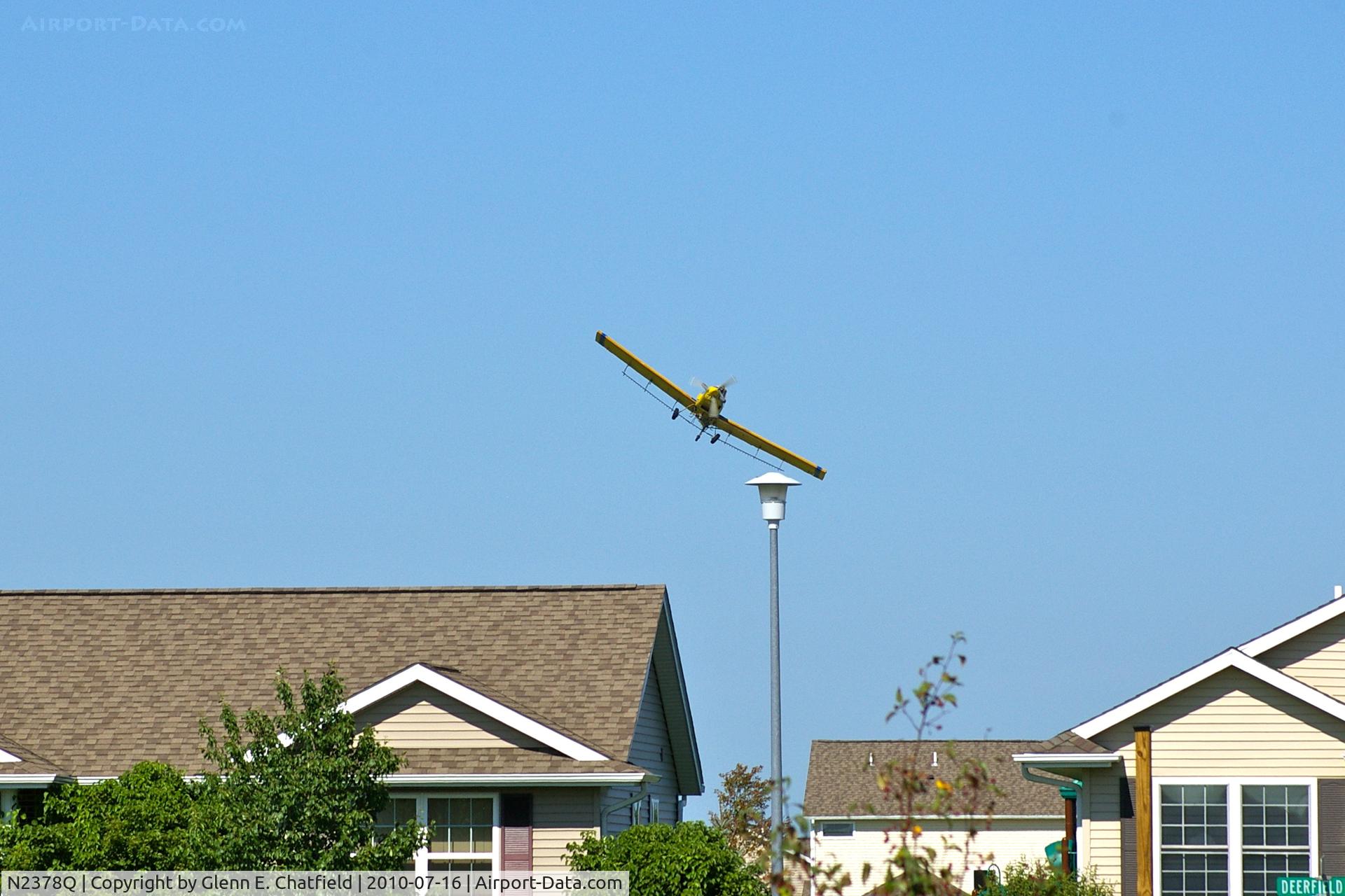 N2378Q, 1982 Air Tractor Inc AT-301 C/N 301-0454, Working the field just west of my neighborhood.  Now watching from my front yard in North Liberty Iowa