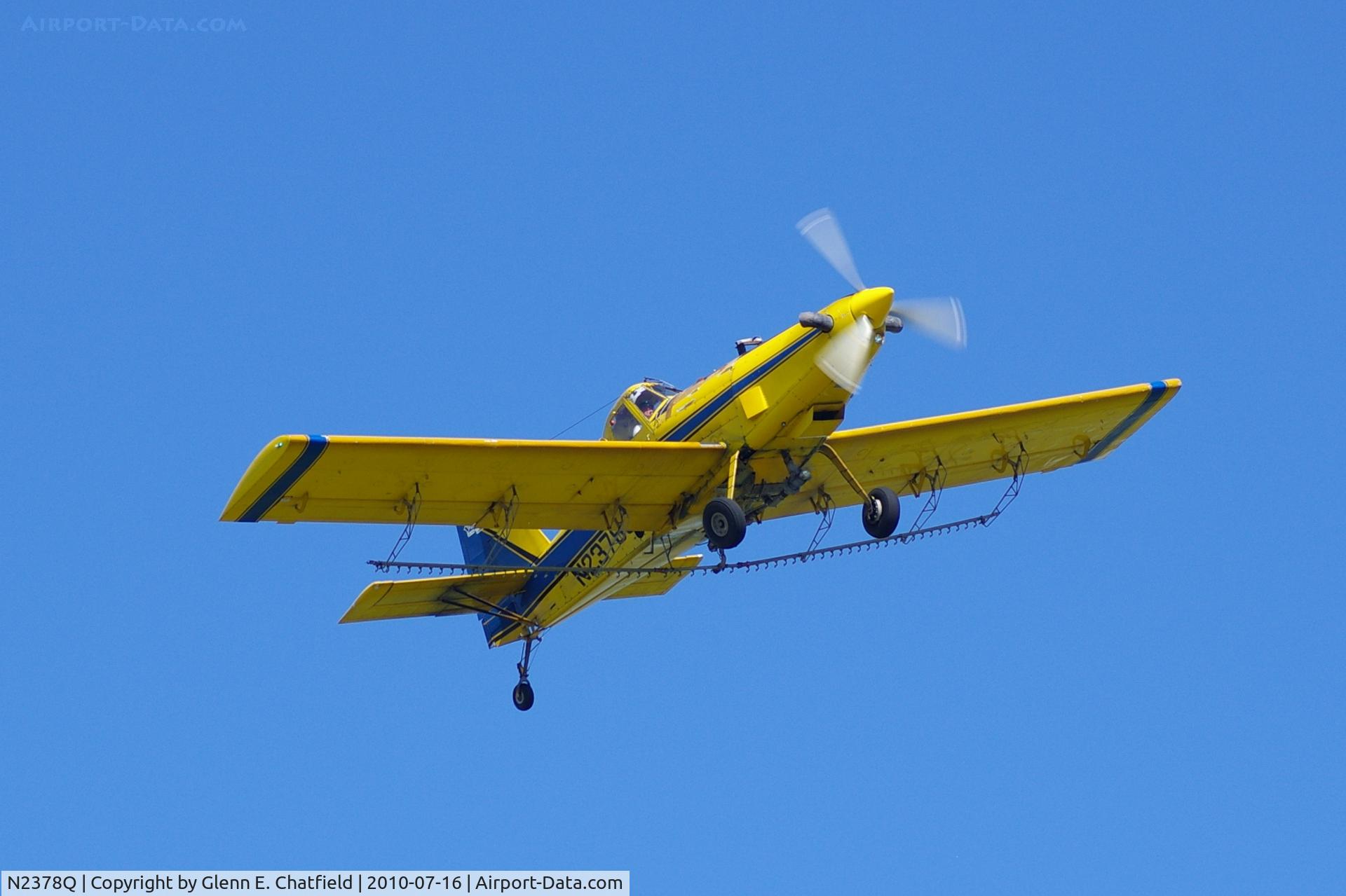 N2378Q, 1982 Air Tractor Inc AT-301 C/N 301-0454, Working the field just west of my neighborhood.  Now watching from my front yard in North Liberty Iowa.