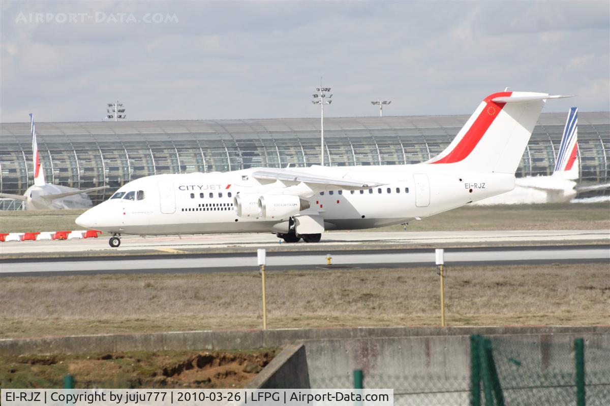 EI-RJZ, 1998 BAe Systems Avro 146-RJ85A C/N E.2326, on landing at CDG whis new peinting below glass